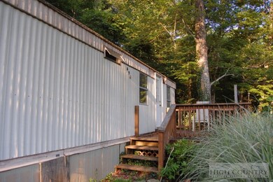 Additional View: Front deck has solar lights to en