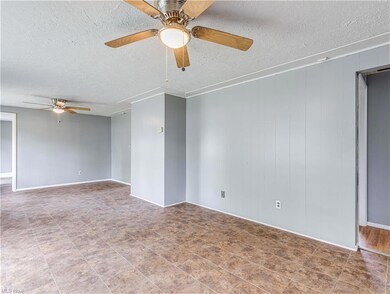 4885 Saddlewood Dr, Sheffield Lake, OH 44054 - photo 6