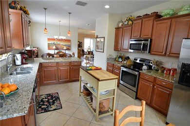 Granite kitchen with stainless appliances