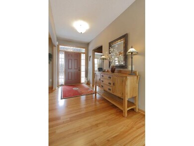 Beautiful hardwood flooring extends throughout the
