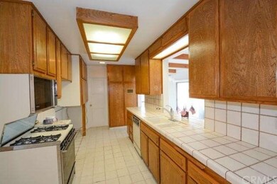 Kitchen has a eat in area and opens to your light 