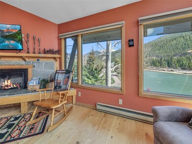 Home office featuring baseboard heating, a high en