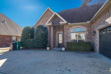 Front door and 2 car garage