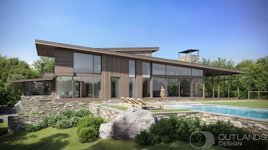 The design vision of the home includes large windows, a screened porch, and an infinity pool facing   the stunning water views.