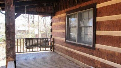 Spacious front porch with swing