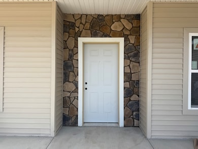 Temporary Front door. Stylish stone around the fro
