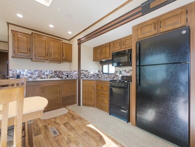 Great kitchen space and larger freezer/fridge combo