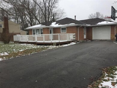 Single car garage, front deck and extra parking ( 
