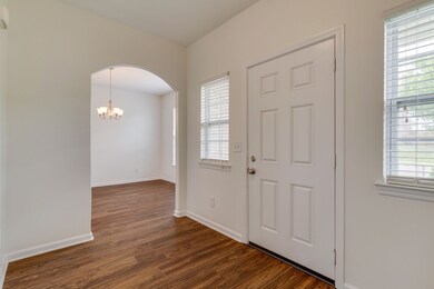 ENTRY FOYER LOOKING TOWARD DINING AREA