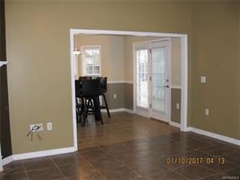 Family room is open to eat-in kitchen area.
