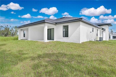 4709-4711 27th St SW, Lehigh Acres, FL 33973 - photo 2