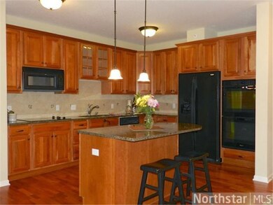 Stunning gourmet kitchen features granite counters