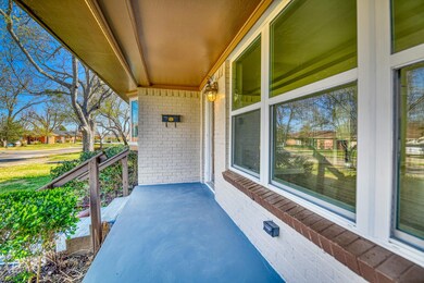 View of patio with a porch