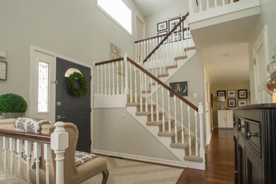 Greet guests in  the open foyer.