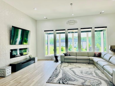 Living room with recessed lighting, wood finished 