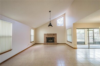 Living room with wood burning fireplace
