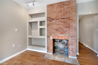 BRICK EXPOSED FIREPLACE