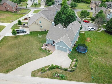 325 S Adams Ct, Raymore, MO 64083 - photo 2