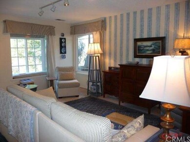 Living room features a window seat.