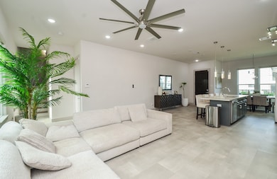 The neutral color palette of the walls and floorin