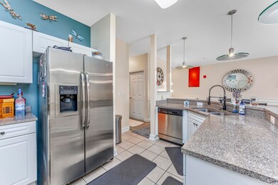 Kitchen featuring decorative light fixtures, light