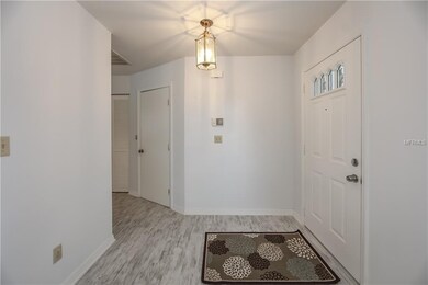 FOYER WITH NEW WOOD LAMINATE FLOORING