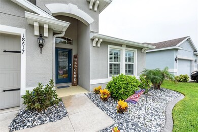 18617 Hunters Meadow Walk, Land O' Lakes, FL 34638 - photo 4