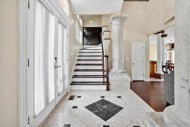 Marble tiled floors with floor-to-ceiling columns.