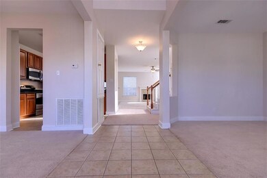 From Foyer leading to Kitchen and Family Area.