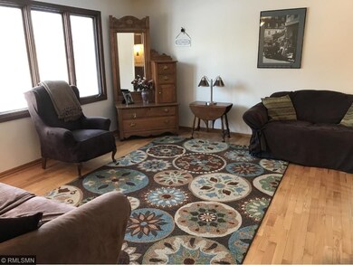 Living room complete with real hardwood floors.