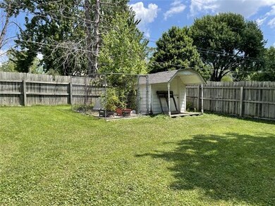 Spacious back yard with shed