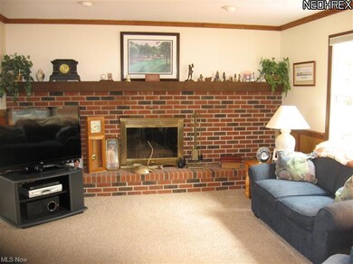 Family Room boasts a full wall woodburning firepla