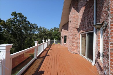 2 levels of lakeside decking that runs the full le