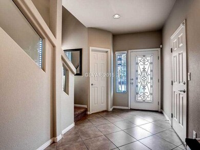 Entry Hall. Tile entry way leads into the open liv