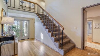 Beautiful oak hardwood floors complemented by plush wall-to-wall carpeting throughout most of the main level.