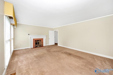 Carpet, Fireplace, crown molding