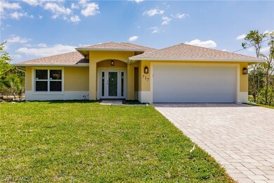 717 Kalamar Dr, Lehigh Acres, FL 33974 - photo 2
