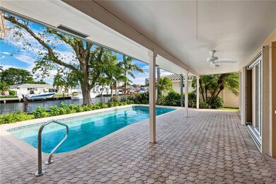 Pool with well-sized backyard and covered patio ov