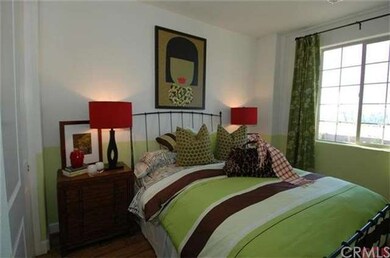 One of the bedrooms located down the hall from the