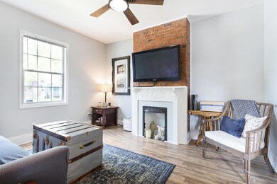 Living room with exposed brick