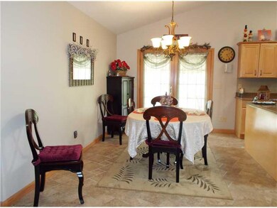 Dining Room. French doors open to the spacious cov
