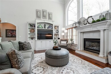 Custom built in and gas fireplace add to the detai