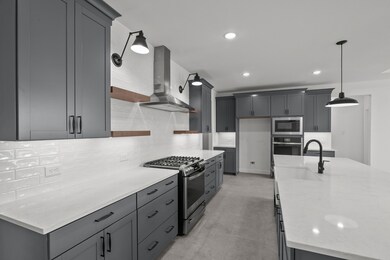 Stylish kitchen with decorative floating shelves