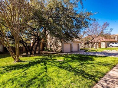View of front of property with brick siding, an a