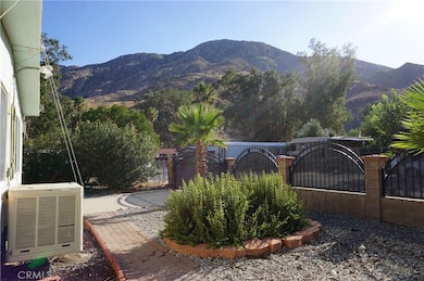 front fenced and gated yard