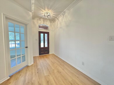 As you enter the foyer, the home office awaits on your right, as well as formal dining room. Brand new luxury laminate flooring throughout the first floor.