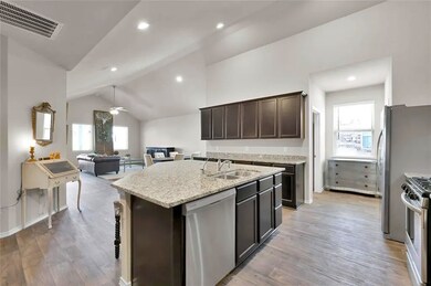 Cathedral ceiling in the kitchen makes the room so spacious