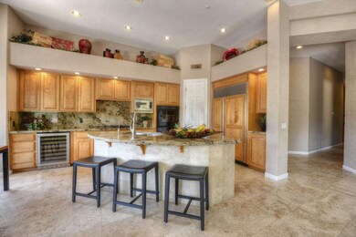 Kitchen w/Granite & Wine Chiller