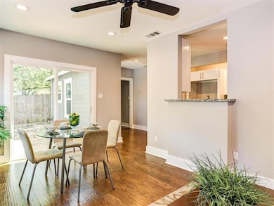 Dining area with recessed lighting, dark wood finished floors, and ceiling fan