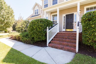 BRICK STEPS LEAD YOU TO THE FRONT ENTRY